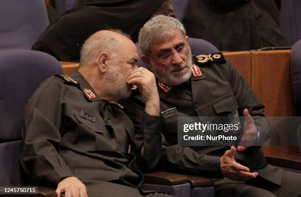 Commander of Iran's Islamic Revolutionary Guard Corps' Quds Force, Esmail Qaani speaks with commander-in-chief of IRGC Major General Hossein Salami...