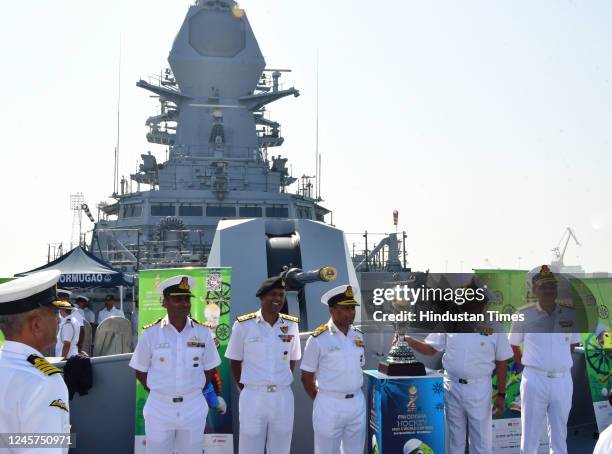 The FIH Hockey Men's World Cup 2023 trophy displayed onboard INS Mormugao in the presence of WNC Ajendra B. Singh, Indian Navy, and Indian hockey...