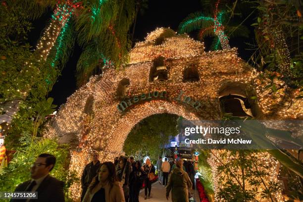 Holiday season lights at the Mission Inn Festival of Lights shine through the Tripledemic case surge on December 15, 2022 in Riverside, California....