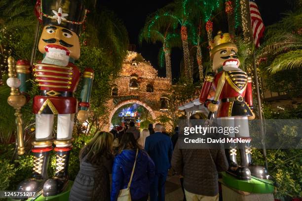 Holiday season lights at the Mission Inn Festival of Lights shine through the Tripledemic case surge on December 15, 2022 in Riverside, California....
