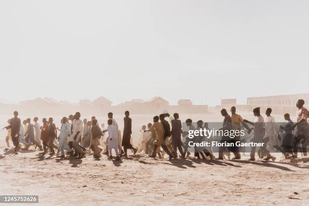 Young people are pictured in the small village, that was destroyed by Boko Haram and rebuilt with german capital on December 19, 2022 in Ngarannam,...