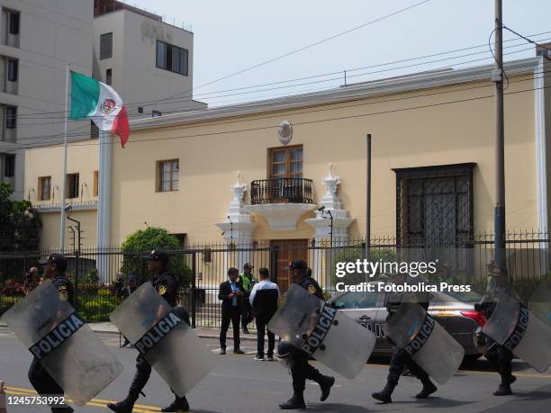 Police guard the Mexican Embassy, where Lilia Paredes, wife of former President Pedro Castillo and her two children, have taken asylum. The...