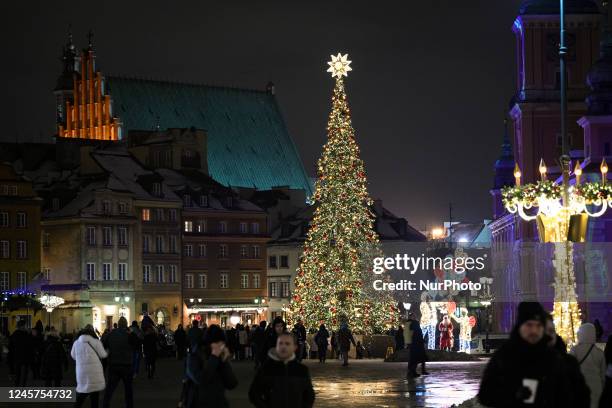 Large decorated Christmas tree is seen on the Royal Castle Square in Warsaw, Poland on 21 December, 2022. Warsaw has been named as one of the top...