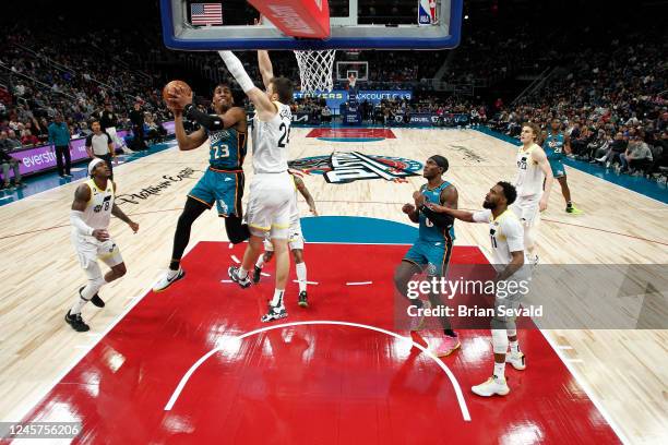 Jaden Ivey of the Detroit Pistons drives to the basket during the game against the Utah Jazz on December 20, 2022 at Little Caesars Arena in Detroit,...