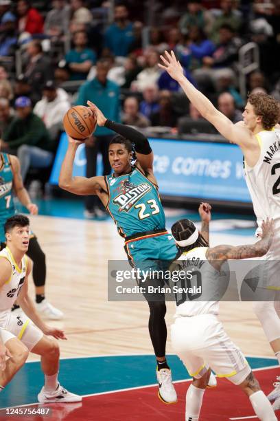 Jaden Ivey of the Detroit Pistons passes the ball during the game against the Utah Jazz on December 20, 2022 at Little Caesars Arena in Detroit,...