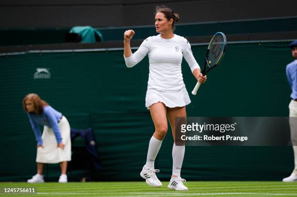 Monica Niculescu of Romania in action against Aryna Sabalenka of Belarus during the first round of The Championships Wimbledon at All England Lawn...