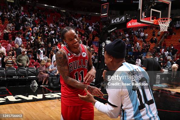 DeMar DeRozan of the Chicago Bulls talks with Kyle Lowry of the Miami  News Photo - Getty Images