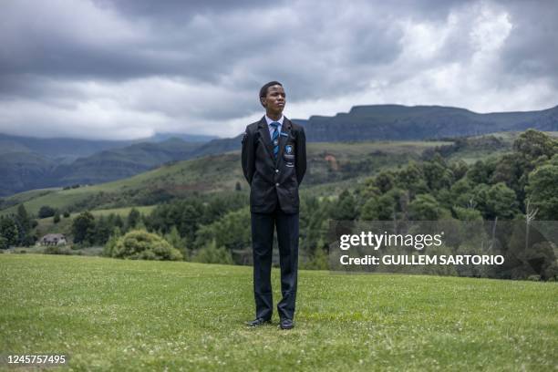 Khwezilomso Msimang a student at the Drakensberg Boys Choir School, poses for a portrait outside of the school near Winterton on December 9, 2022. -...
