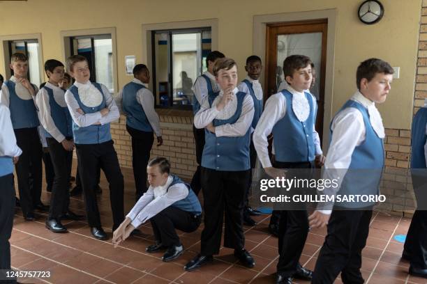 Students from the Drakensberg Boys Choir line up before singing in a Christmas function at the school near Winterton on December 10, 2022. - The...