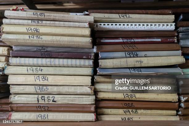 General view of old music books on a shelf at the Drakensberg Boys Choir School near Winterton on December 9, 2022. - The Drakensberg Boys School...