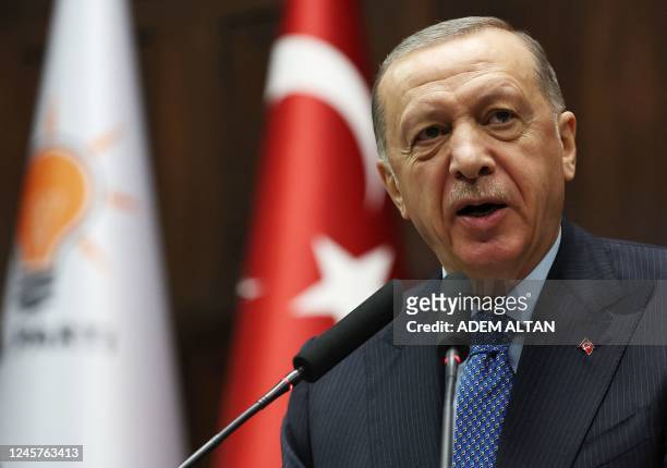 Turkish President and leader of the Justice and Development Party Recep Tayyip Erdogan delivers a speech during his party's group meeting at Turkish...