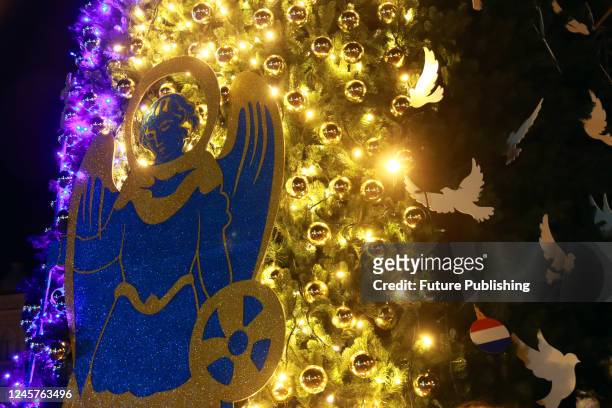 The main country's "Christmas tree of invincibility" lit up with holiday illuminations in Sofiyska Square, Kyiv, capital of Ukraine.
