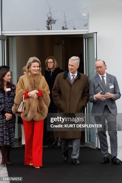 Queen Mathilde of Belgium and King Philippe - Filip of Belgium listen to explanations from managing director Wino Baeckelandt during a royal...