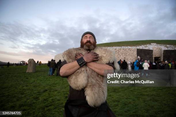 Shaman is seen meditating as people gather to witness the winter solstice on December 21, 2022 in Newgrange, Ireland. Crowds are gathering at...