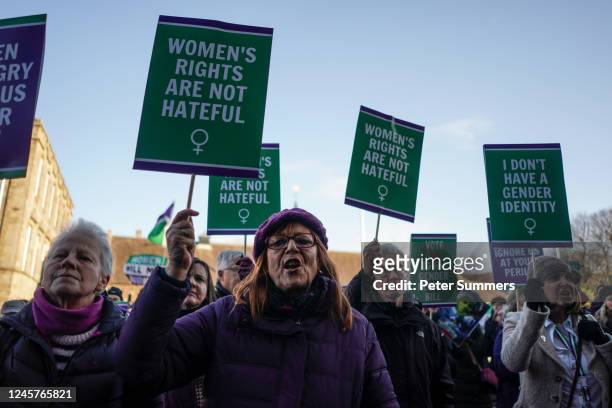 Protesters are seen outside the Scottish Parliament during a No to Self-ID protest on December 21, 2022 in Edinburgh, Scotland. MSPs consider...