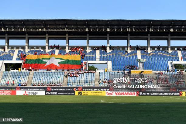 Myanmar fans cheer in Myanmar s 1-0 loss to Malaysia in the AFF Mitsubishi electric Cup 2022 Group match at Thuwanna Football Stadium, Yangon on...