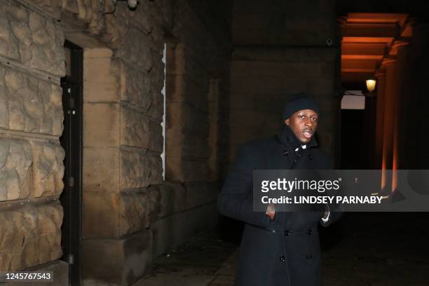 Manchester City and France footballer Benjamin Mendy leaves the Chester Crown Court in Chester, northwest England, on December 21, 2022. - A jury...
