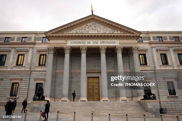 This picture taken on December 21, 2022 shows the main facade of Congress of Deputies, Spain's parliament, in Madrid. - A transgender rights bill to...