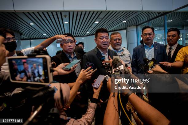 Pahang State Councilor Sim Chon Siang speaks to press members during a special press conference after arriving with 6 victims of human trafficking at...