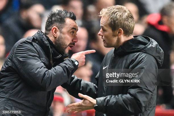Brighton's Italian head coach Roberto De Zerbi argues with fourth official referee during the English League Cup fourth round football match between...