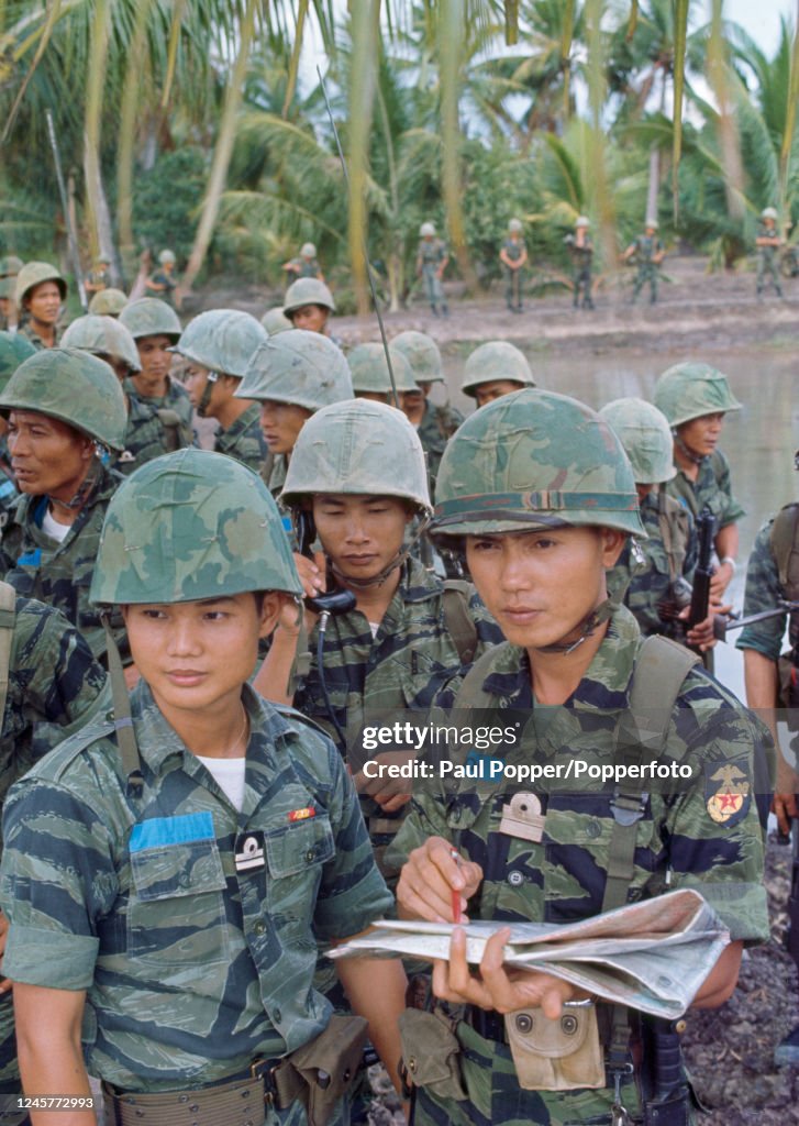 Major Soen of the South Vietnamese Army with his unit on the banks of  News Photo - Getty Images