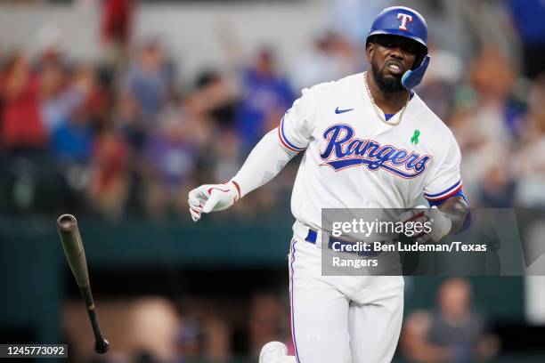 Adolis Garcia of the Texas Rangers reacts after hitting a home run during a game against the Tampa Bay Rays at Globe Life Field on May 31, 2022 in...