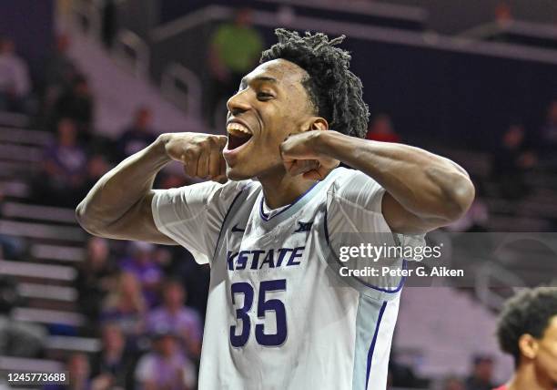 Nae'Qwan Tomlin of the Kansas State Wildcats reacts after scoring a basket in the second half against the Radford Highlanders at Bramlage Coliseum on...