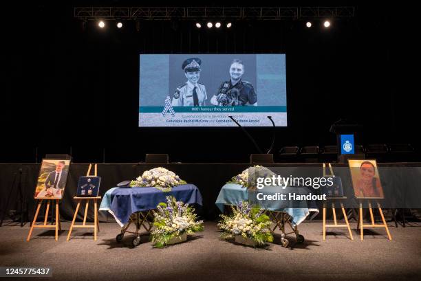 In this handout photo provided by Queensland Police Service, a memorial service is held for Constable Rachel McCrow and Constable Matthew Arnold on...