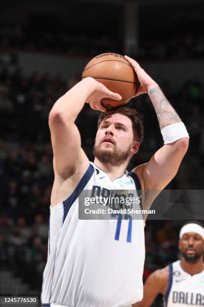 Luka Doncic of the Dallas Mavericks shoots the ball during the game against the Minnesota Timberwolves on December 21, 2022 at Target Center in...