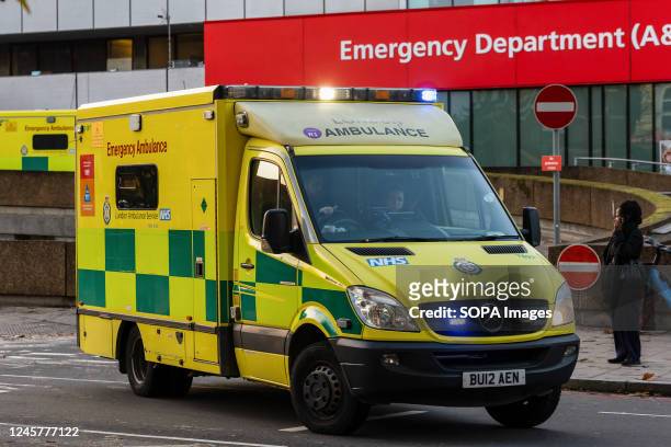 An ambulance on a blue light run belonging to the London Ambulance Service leaves St Thomas' Hospital. More than 10,000 NHS ambulance staff from nine...