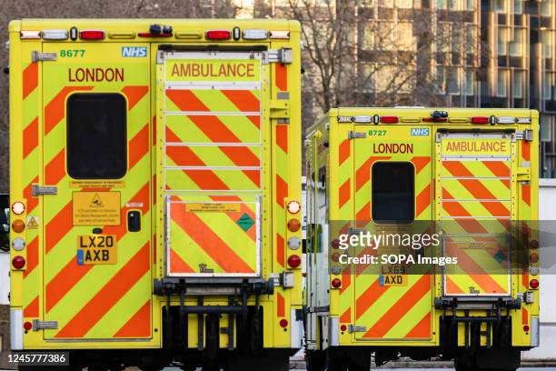 Ambulances belonging to the London Ambulance Service are seen parked at St Thomas' Hospital. More than 10,000 NHS ambulance staff from nine NHS...