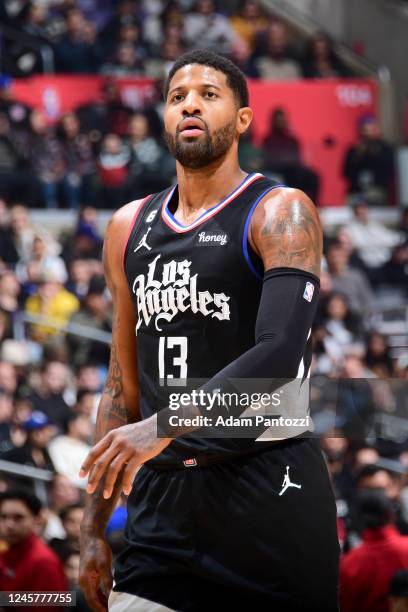 Paul George of the LA Clippers looks on during the game against the Charlotte Hornets on December 21, 2022 at Crypto.Com Arena in Los Angeles,...