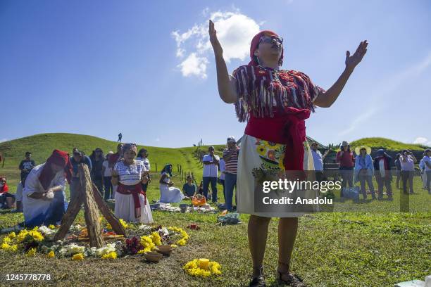 Salvadoran indigenous women perform a ritual while participating in an ancestral indigenous ceremony for the Winter Solstice held at the San AndrÃ©s...