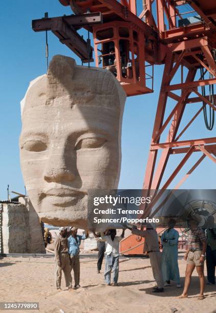 Rescuing and relocating the ancient Egyptian temple at Abu Simbel from the construction of the man-made Lake Nasser, circa 1967. The temple was...