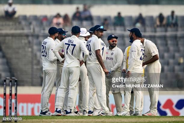 India's cricketers celebrate after the dismissal of Bangladesh's Mehidy Hasan Miraz during the first day of the second cricket Test match between...