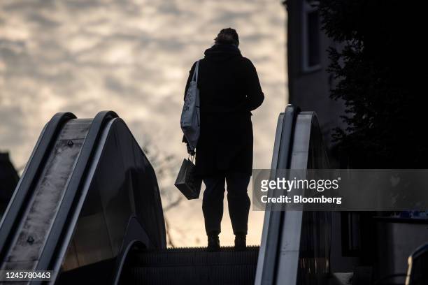 Shopper rides an escalator in Budapest, Hungary, on Wednesday, Dec. 21, 2022. Hungarys central bank dampened expectations for monetary easing, saying...