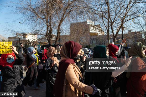 Afghan women protest against new Taliban ban on women accessing University Education on December 22, 2022 in Kabul, Afghanistan. A group of Afghan...