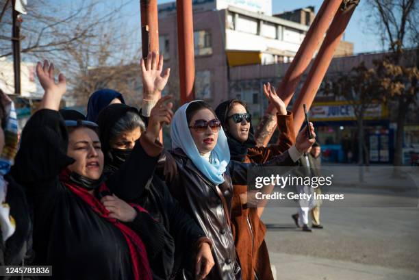 Afghan women protest against new Taliban ban on women accessing University Education on December 22, 2022 in Kabul, Afghanistan. A group of Afghan...