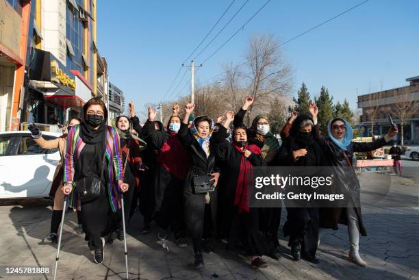 Afghan women protest against new Taliban ban on women accessing University Education on December 22, 2022 in Kabul, Afghanistan. A group of Afghan...