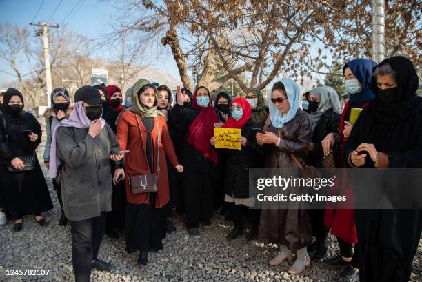 Afghan women protest against new Taliban ban on women accessing University Education on December 22, 2022 in Kabul, Afghanistan. A group of Afghan...