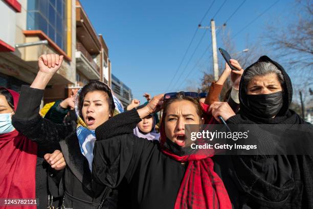 Afghan women protest against a new Taliban ban on women accessing University Education on December 22, 2022 in Kabul, Afghanistan. A group of Afghan...