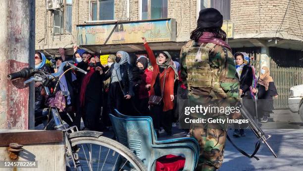 Afghan women protest against a new Taliban ban on women accessing University Education on December 22, 2022 in Kabul, Afghanistan. A group of Afghan...