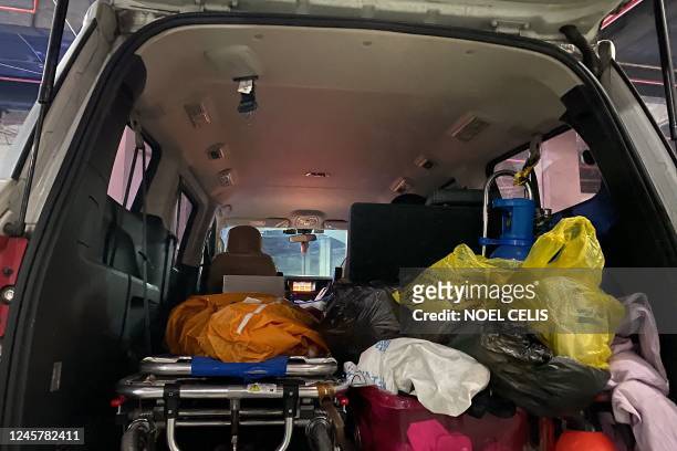 Body is pictured inside a hearse to be cremated at a crematorium in China's southwestern city of Chongqing on December 22, 2022.