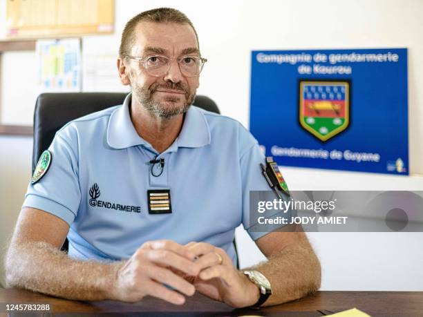 This photograph taken on October 13 shows Lieutenant Colonel Arnaud Amestoy, Company Commander for the French gendarmerie in Kourou, speaking at the...