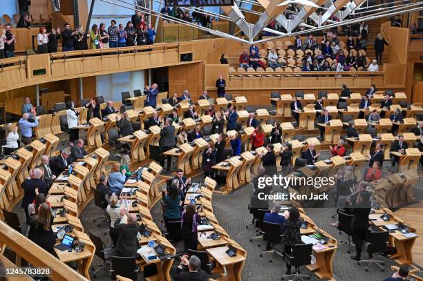 First Minister Nicola Sturgeon and MSPs applaud supporters of the controversial Gender Recognition Reform Bill in the public gallery, as the Bill was...