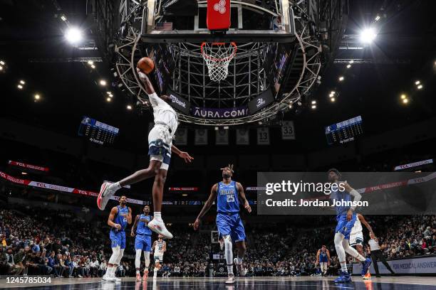 Naz Reid of the Minnesota Timberwolves drives to the basket during the game against the Dallas Mavericks on December 19, 2022 at Target Center in...