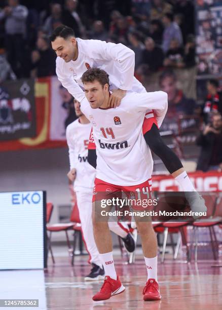 Sasha Vezenkov, #14 and Kostas Sloukas, #11 of Olympiacos Piraeus react during the 2022-23 Turkish Airlines EuroLeague Regular Season Round 15 game...