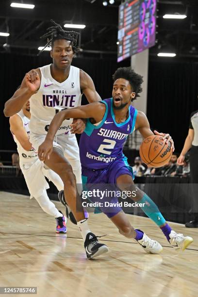 Kobi Simmons of the Greensboro Swarm drives to the basket against the G League Ignite during the 2022-23 G League Winter Showcase on December 22,...