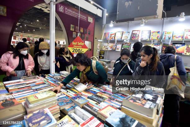 People arrived at Delhi Book Fair on the opening day, at Pragati Maidan on December 22, 2022 in New Delhi, India. The fair will be organised from...