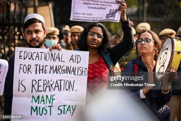 Members of AISA and other Students Unions shout slogans during the Protest against the Scrapping of Maulana Azad National Fellowship MANF outside the...
